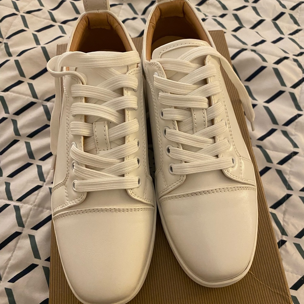 Women’s white sneakers with red bottom